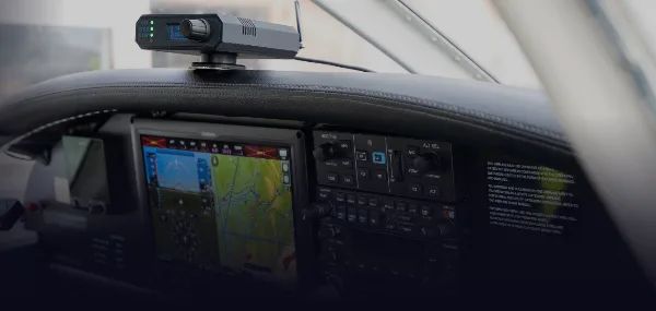 A flight data recorder mounted in an aircraft cockpit
