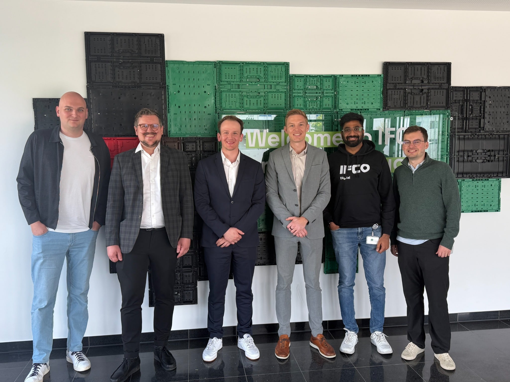 IFCO and NexCon team members collaborating on the Tracking-as-a-Service solution